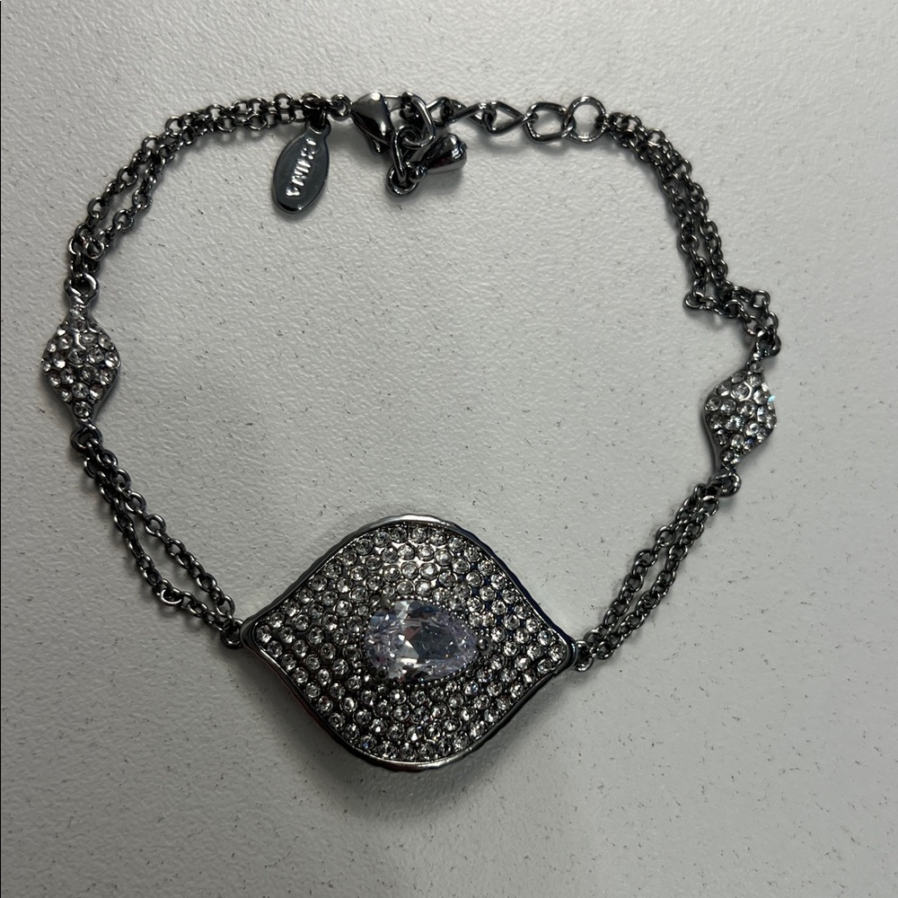 JTV JOAN BOYCE, GUNMETAL TONE
WITH WHITE CRYSTAL EVIL EYE
STATION BRACELET - Picture 2 of 7